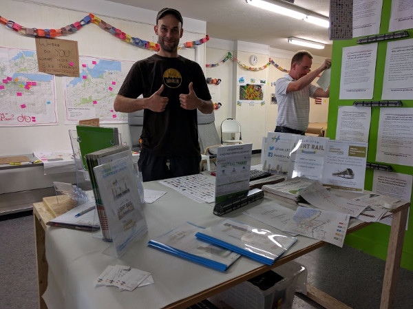 Volunteers Dave Michal and Mark Rejhon at the LRT table